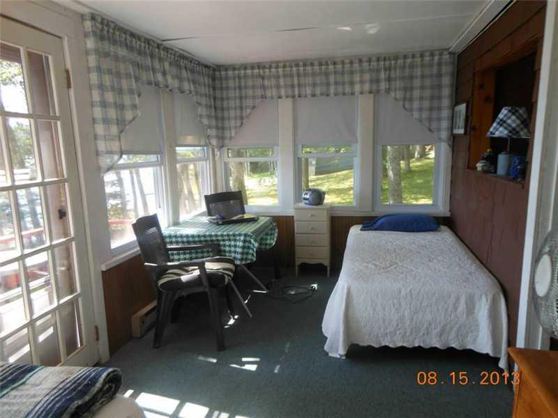 40 Rustic Drive Litchfield, ME 04350 - Photo 10 of 17 Covered Porch. Enjoy the covered...