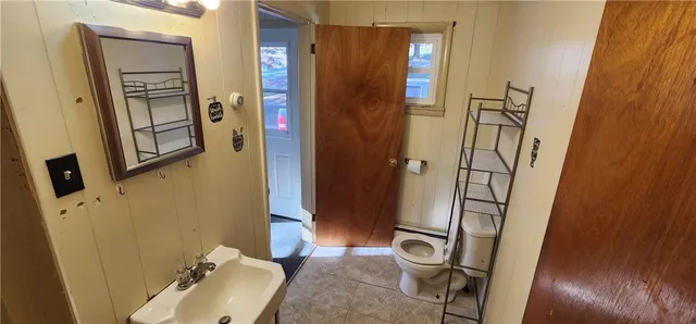 a bathroom with sink and shower
