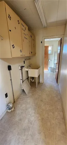 a spacious bathroom with a tub and shower