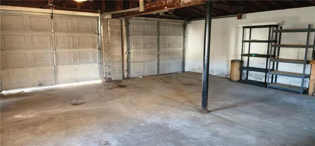 a view of empty room with windows