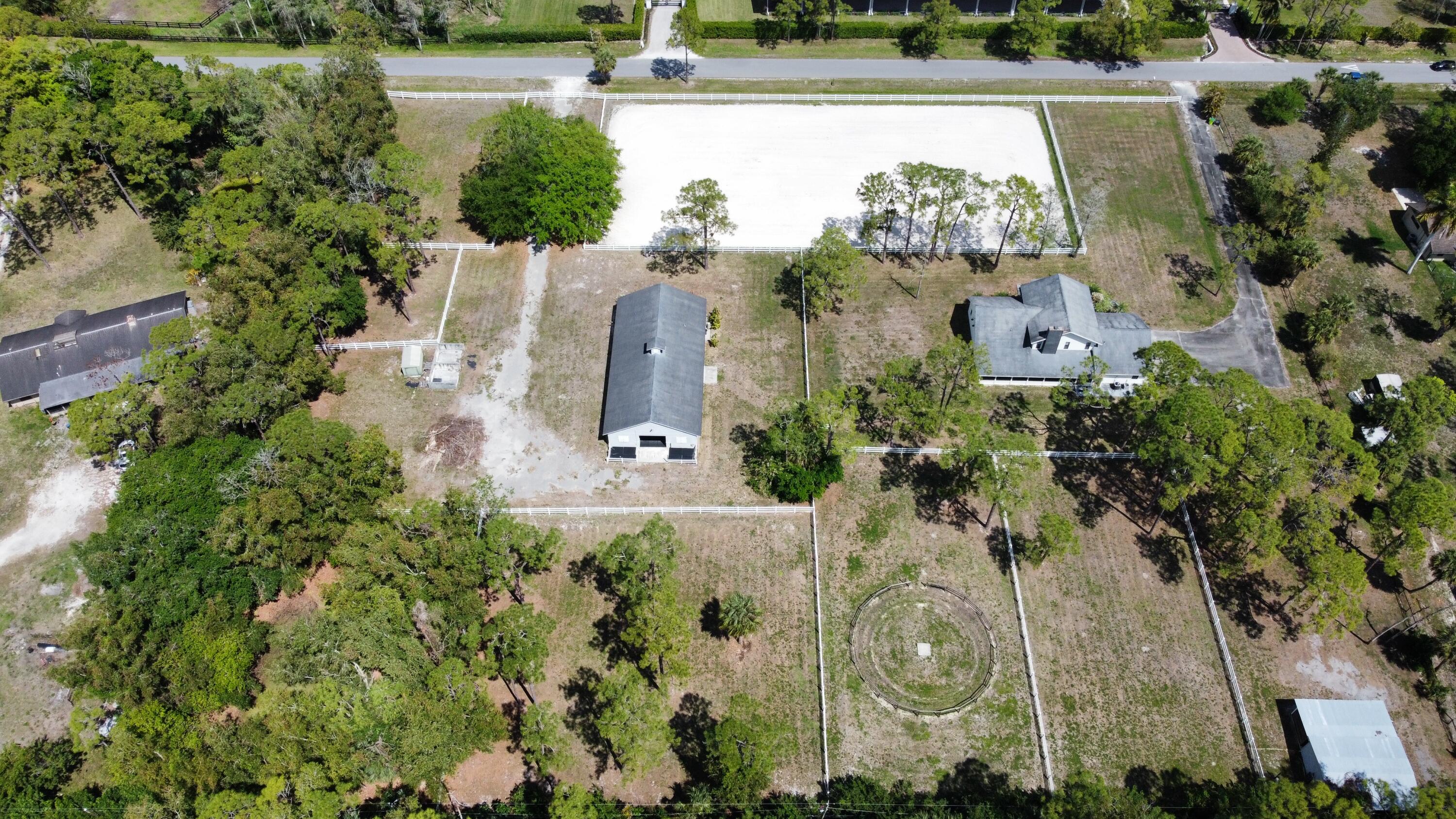 13346 Casey Road Loxahatchee Groves, FL 33470 - Photo 2 of 41 dji_fly_20260327_121848_603_177462923896