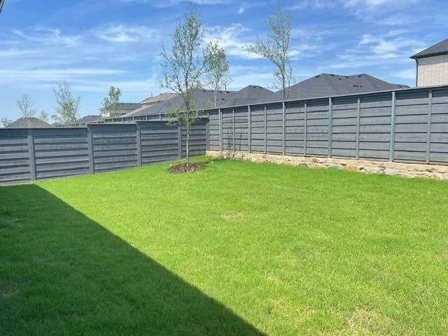 a view of a backyard with a garden