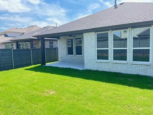 7108 Dragonfly Lane Little Elm, TX 76227 - Photo 9 of 9 a view of an house with backyard space and balcony