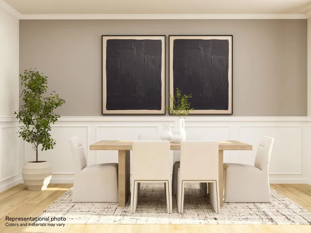 a living room with a large window and table