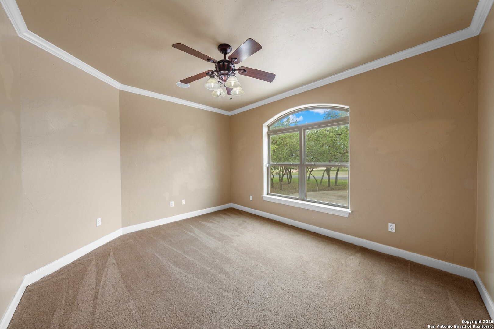 130 Rhum Road Kerrville, TX 78028 - Photo 13 of 31 an empty room with windows and fan