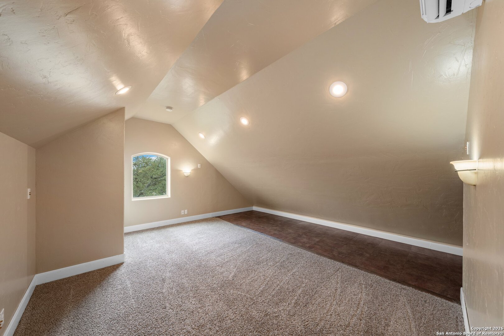 130 Rhum Road Kerrville, TX 78028 - Photo 16 of 31 an empty room with windows and entrance