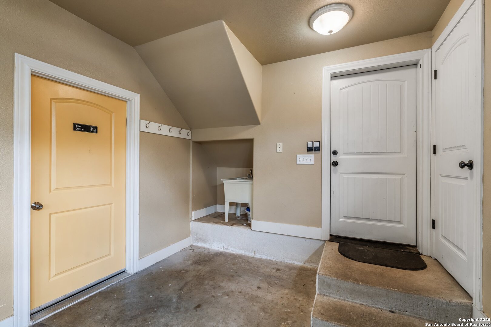130 Rhum Road Kerrville, TX 78028 - Photo 23 of 31 a view of a hallway with closet and wooden door