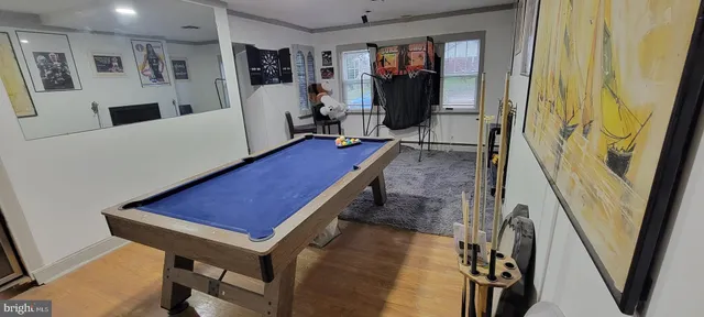 a room with furniture and a wooden floor