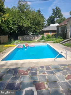 a view of an outdoor space and swimming pool