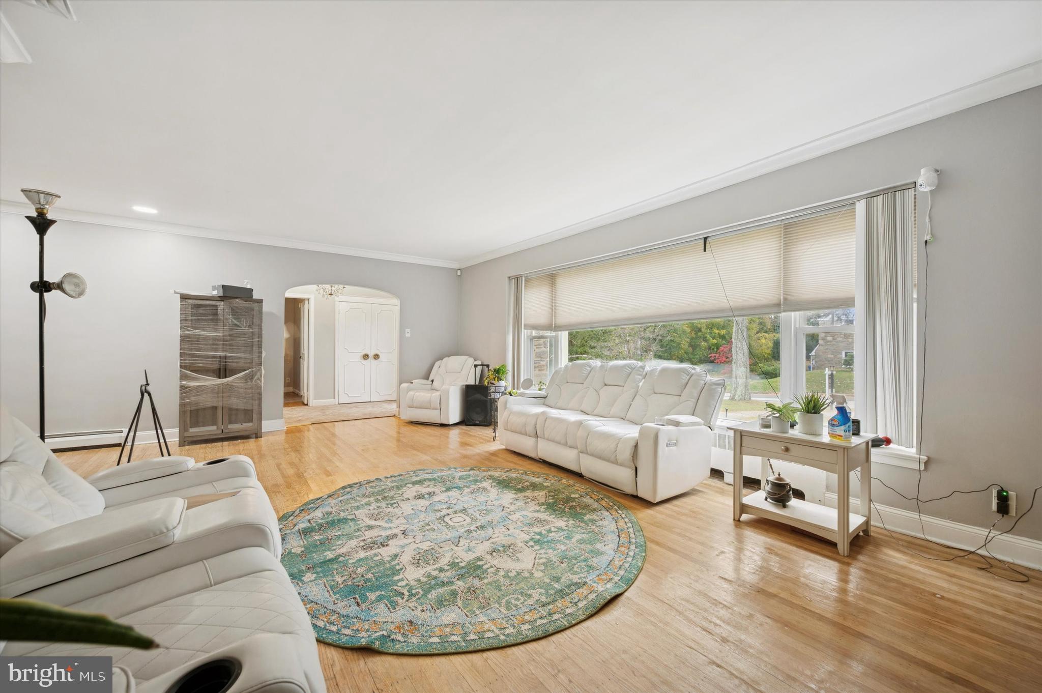 7500 Manchester Road Elkins Park, PA 19027 - Photo 4 of 23 a living room with furniture and a large window