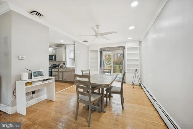 a view of a dining room with furniture