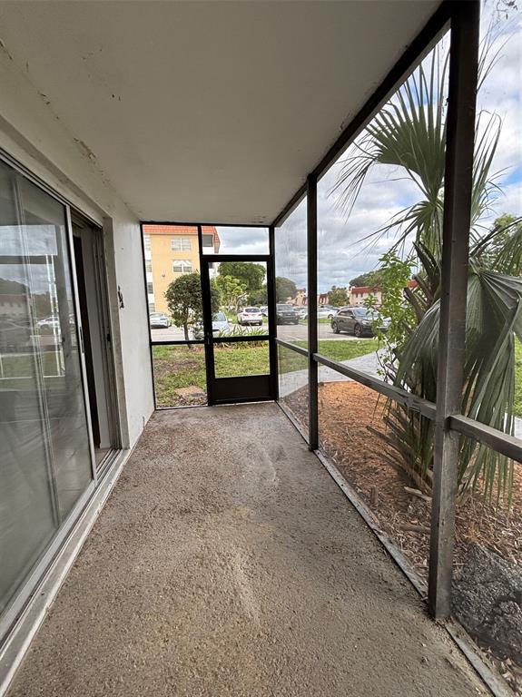 4152 Inverrary Drive, Unit 101 Lauderhill, FL 33319 - Photo 11 of 11 wooden floor in an empty room with a window