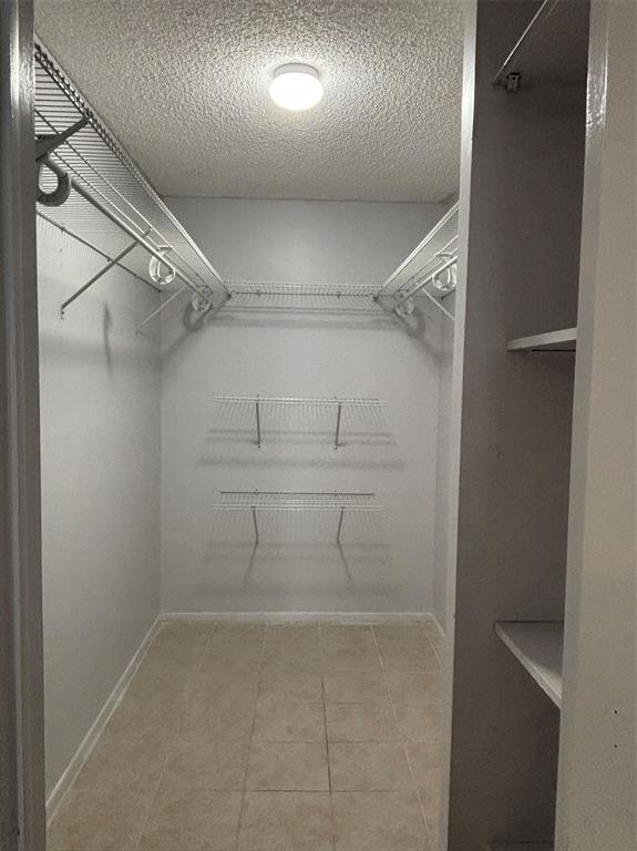 4152 Inverrary Drive, Unit 101 Lauderhill, FL 33319 - Photo 8 of 11 a view of a room with racks on the wall