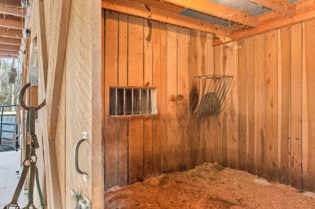 a view of a bathroom with shower and a curtain