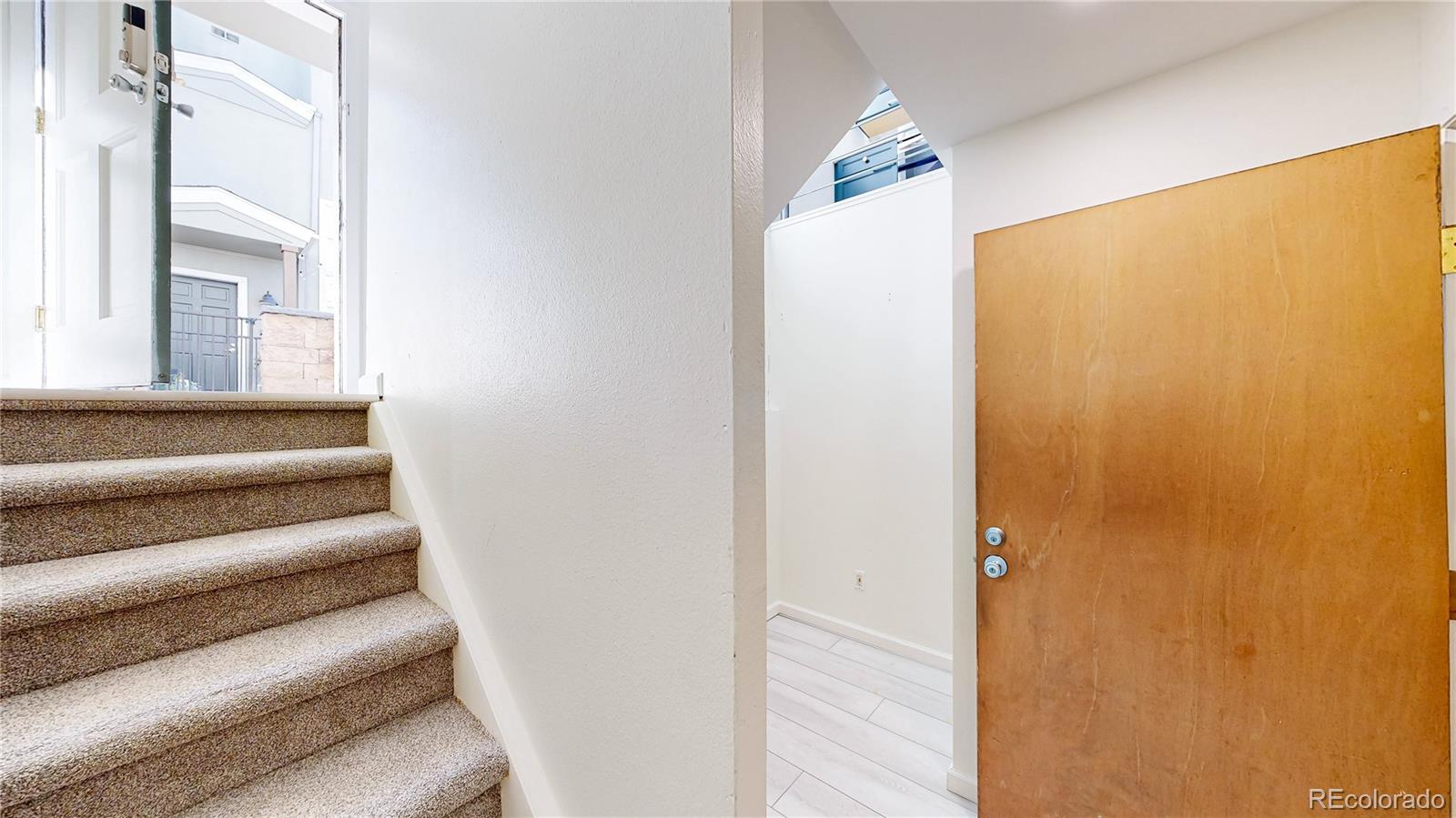 1300 Garfield Street, Unit 1A Denver, CO 80206 - Photo 20 of 33 a view of a staircase