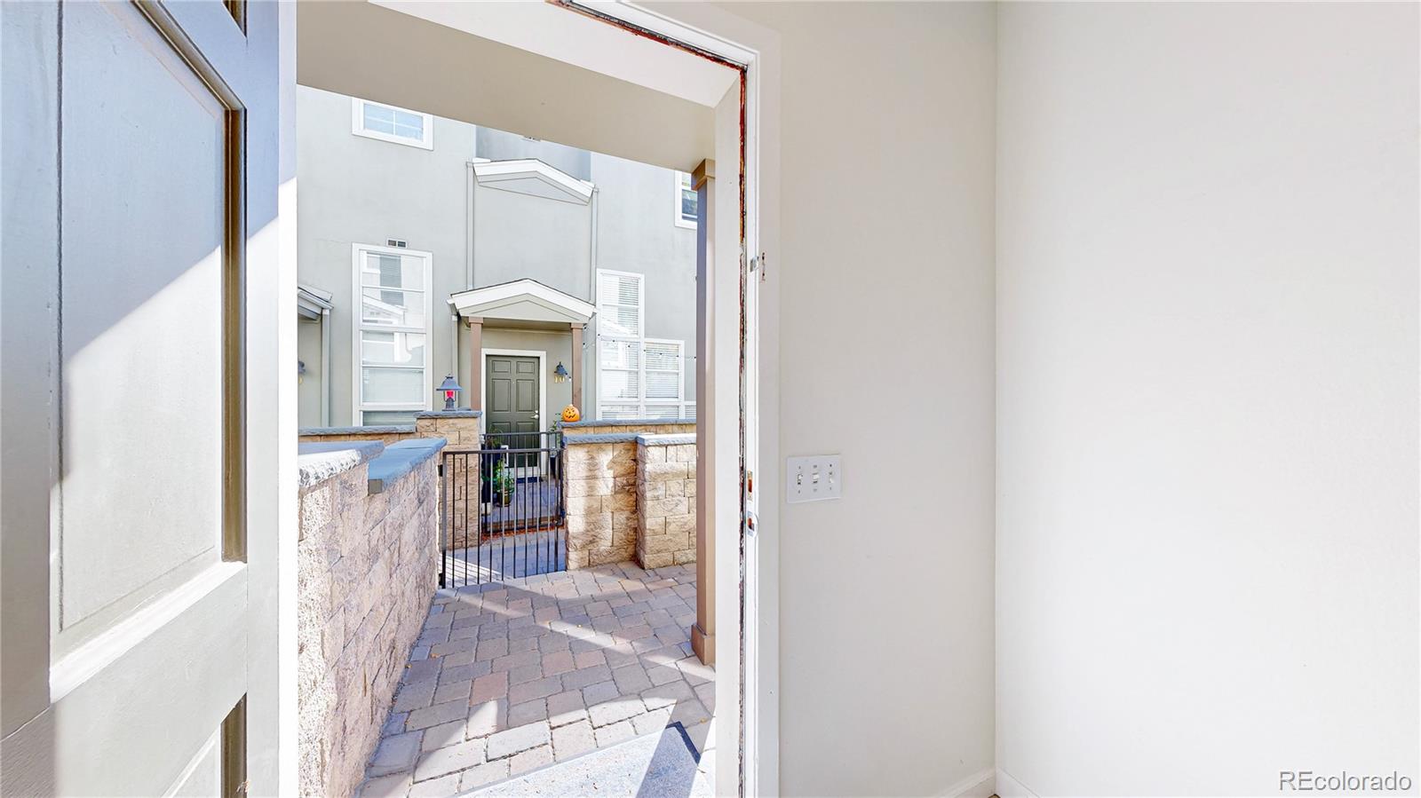 1300 Garfield Street, Unit 1A Denver, CO 80206 - Photo 24 of 33 a view of a living room with a fireplace