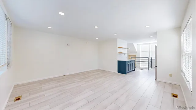 a view of kitchen with wooden floor