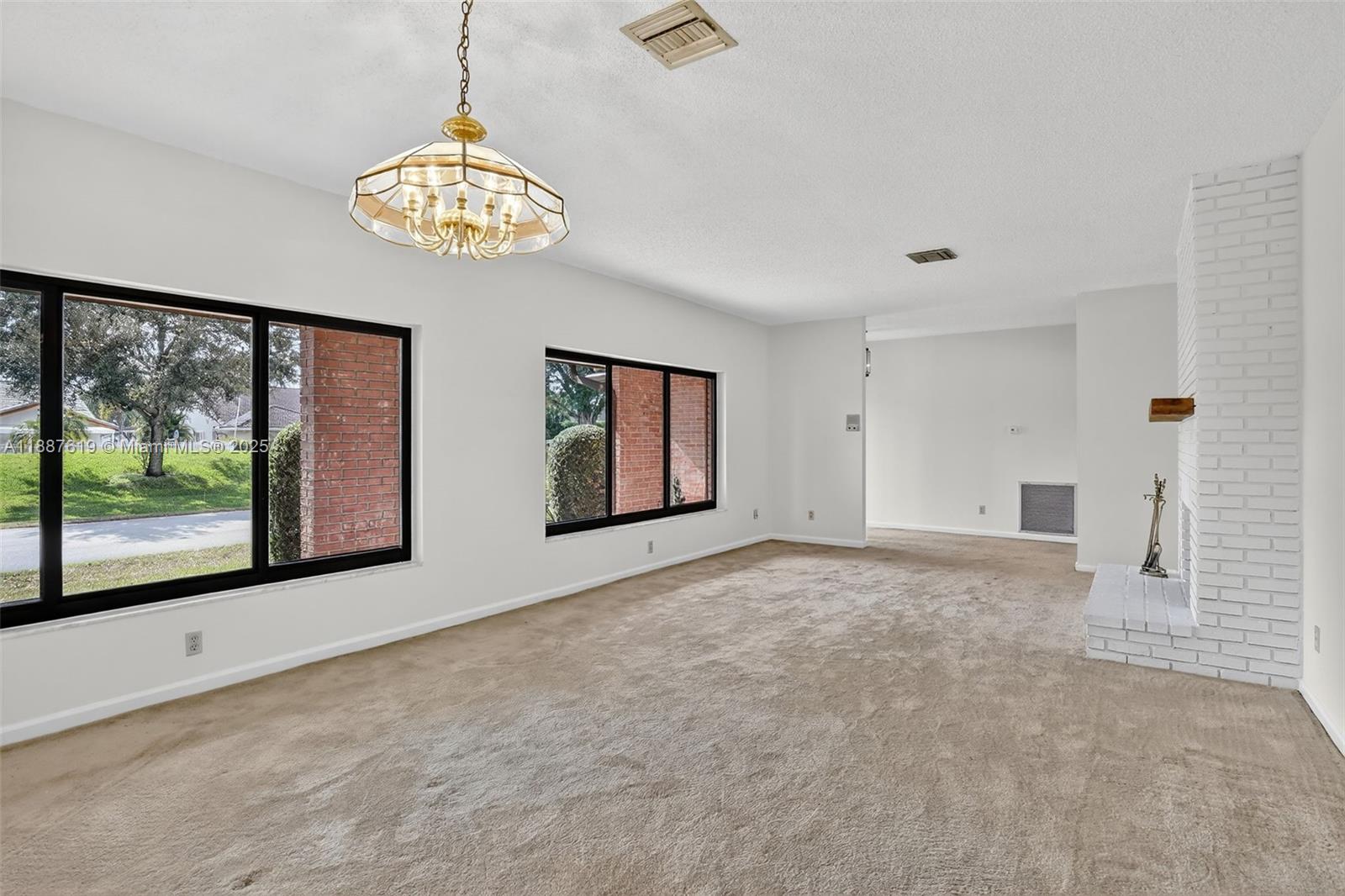100 129th Avenue Plantation, FL 33325 - Photo 15 of 60 a view of an empty room with a window