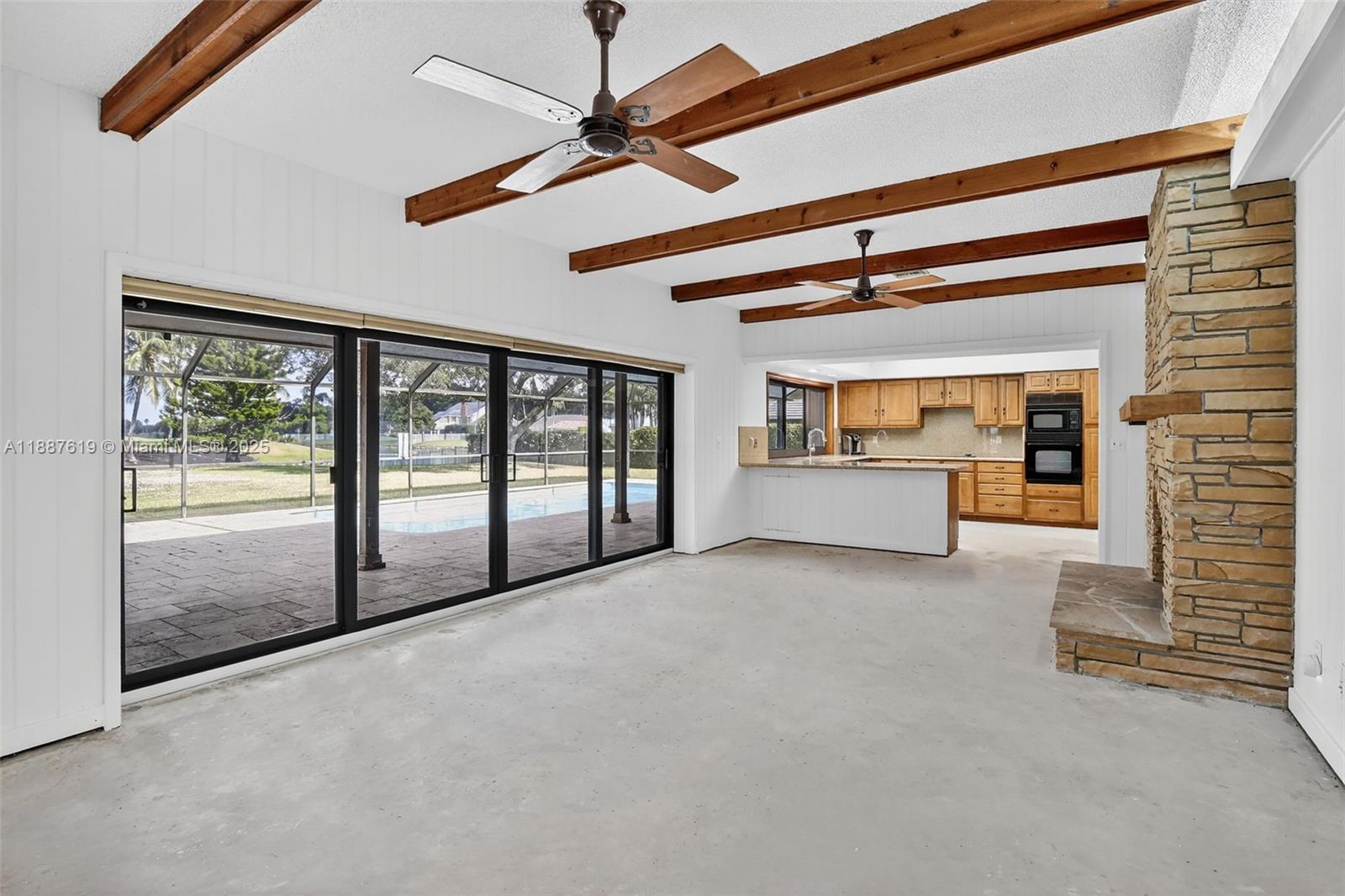 100 129th Avenue Plantation, FL 33325 - Photo 16 of 60 a view of an empty room and a balcony