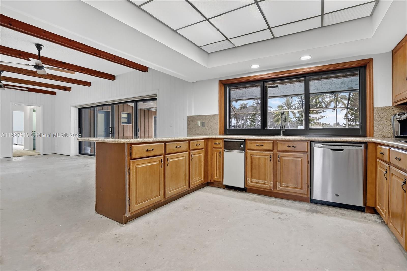 100 129th Avenue Plantation, FL 33325 - Photo 21 of 60 a large white kitchen with stainless steel appliances granite countertop a stove and a sink