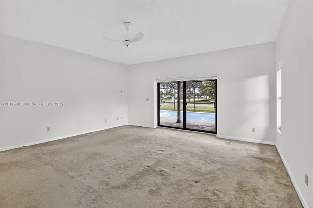 a view of an empty room with window