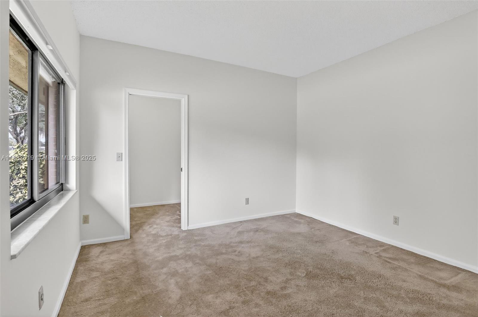 100 129th Avenue Plantation, FL 33325 - Photo 38 of 60 an empty room with windows