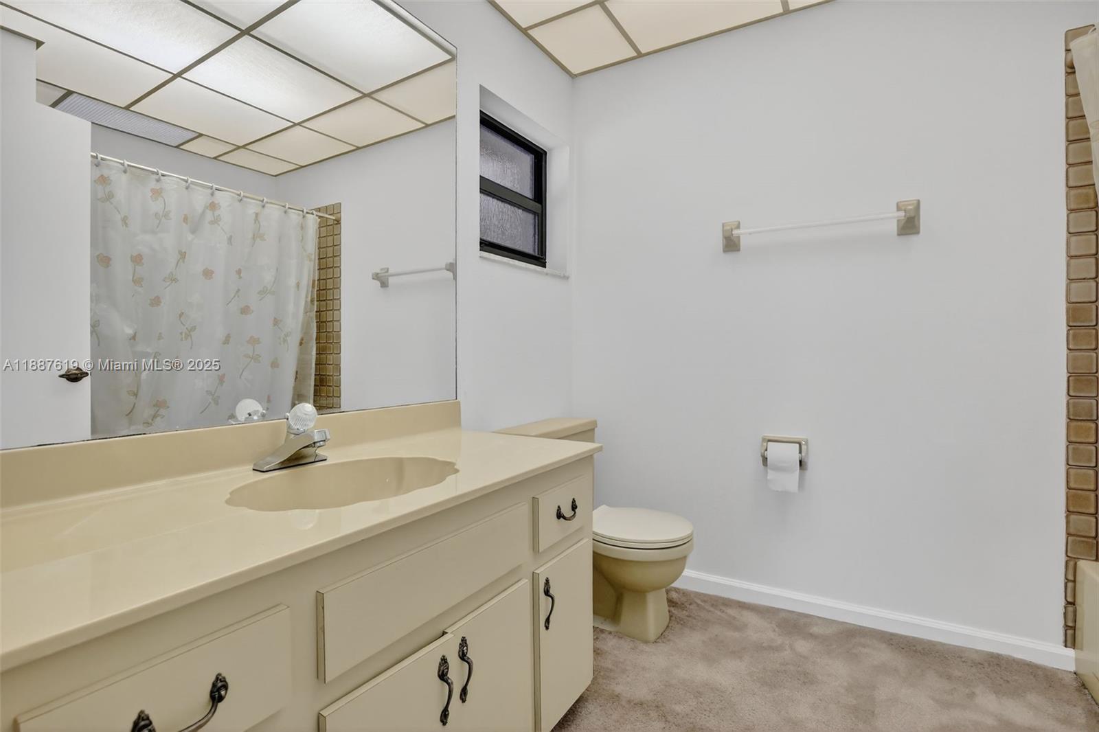 100 129th Avenue Plantation, FL 33325 - Photo 40 of 60 a bathroom with a sink a toilet and shower