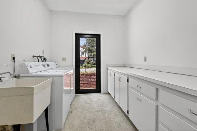 an aerial view of residential houses and outdoor space
