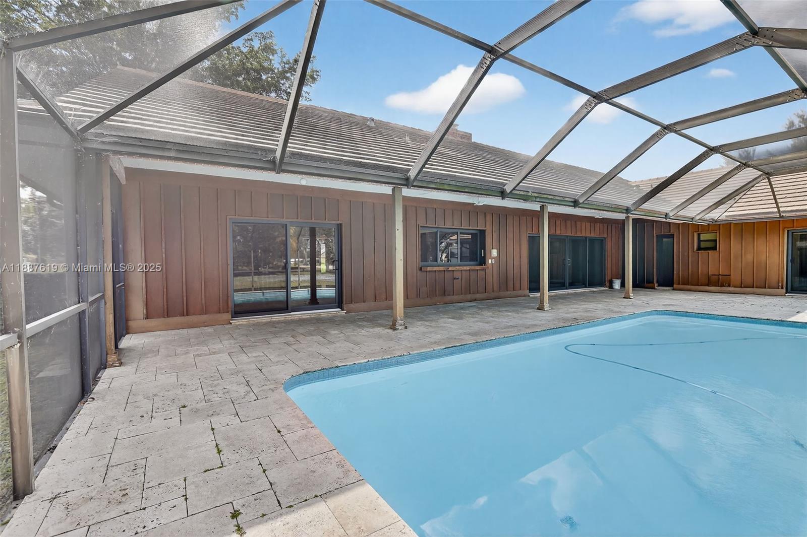 100 129th Avenue Plantation, FL 33325 - Photo 49 of 60 a view of a hall with wooden floor