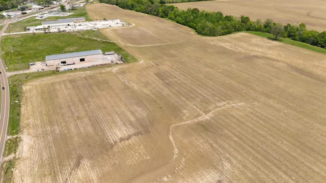 a view of a road with a yard