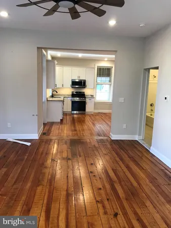 a view of kitchen with cabinets