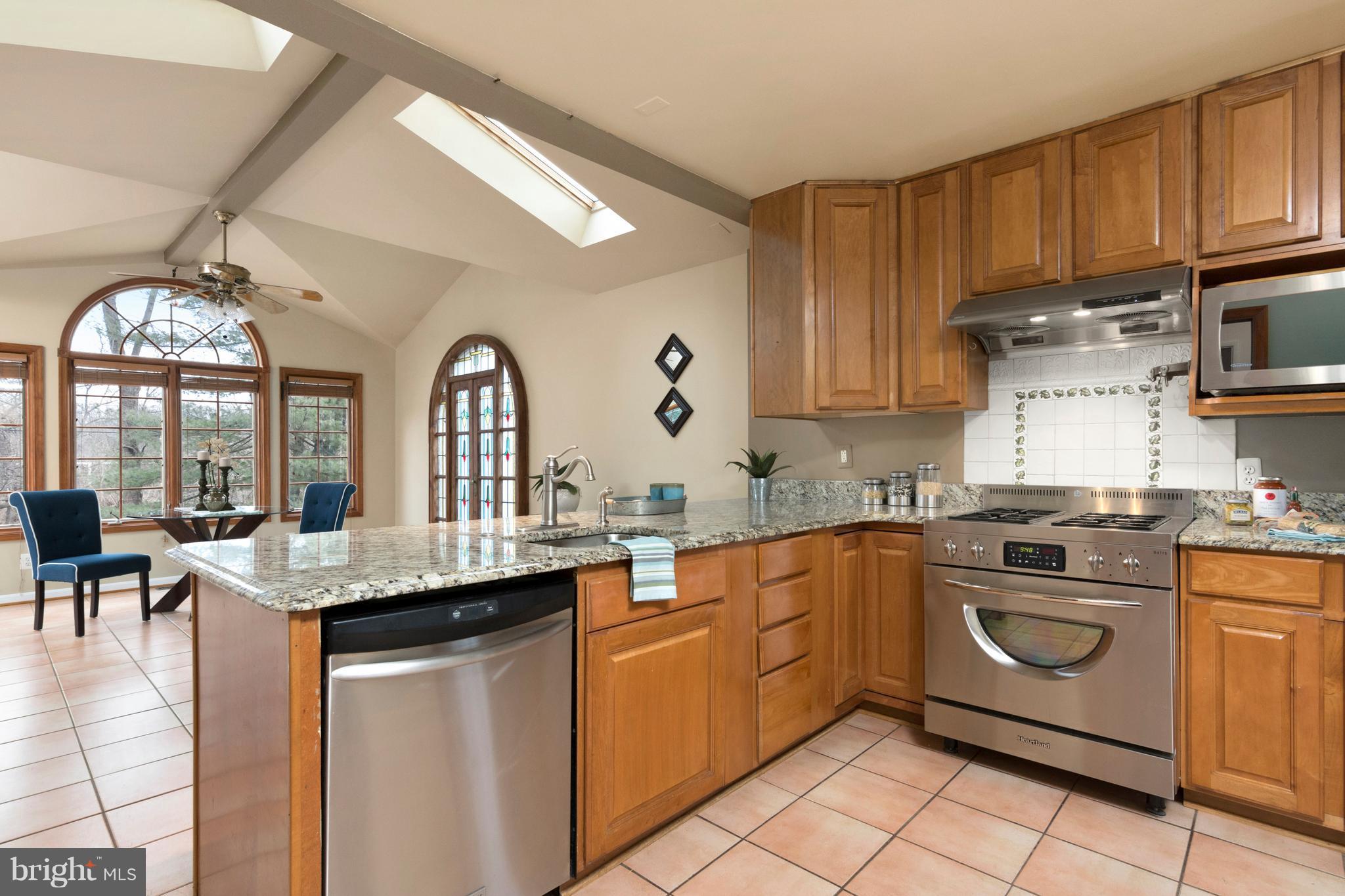 4033 High Point Road Ellicott City, MD 21042 - Photo 6 of 28 Expanded Kitchen w/ Large Eating/Sitting area