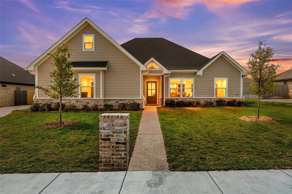 929 Northern Dancer Drive Hewitt, TX 76643 - Photo 2 of 36 a front view of a house with garden
