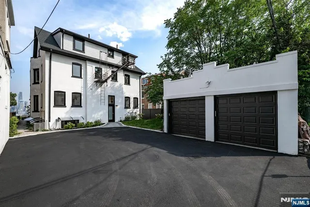 front view of a house with a street