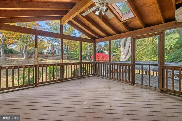 a view of a porch with wooden floor