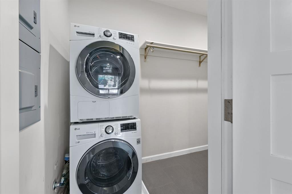 3110 Red River Street, Unit 116 Austin, TX 78705 - Photo 4 of 8 a view of storage and utility room with washer and dryer
