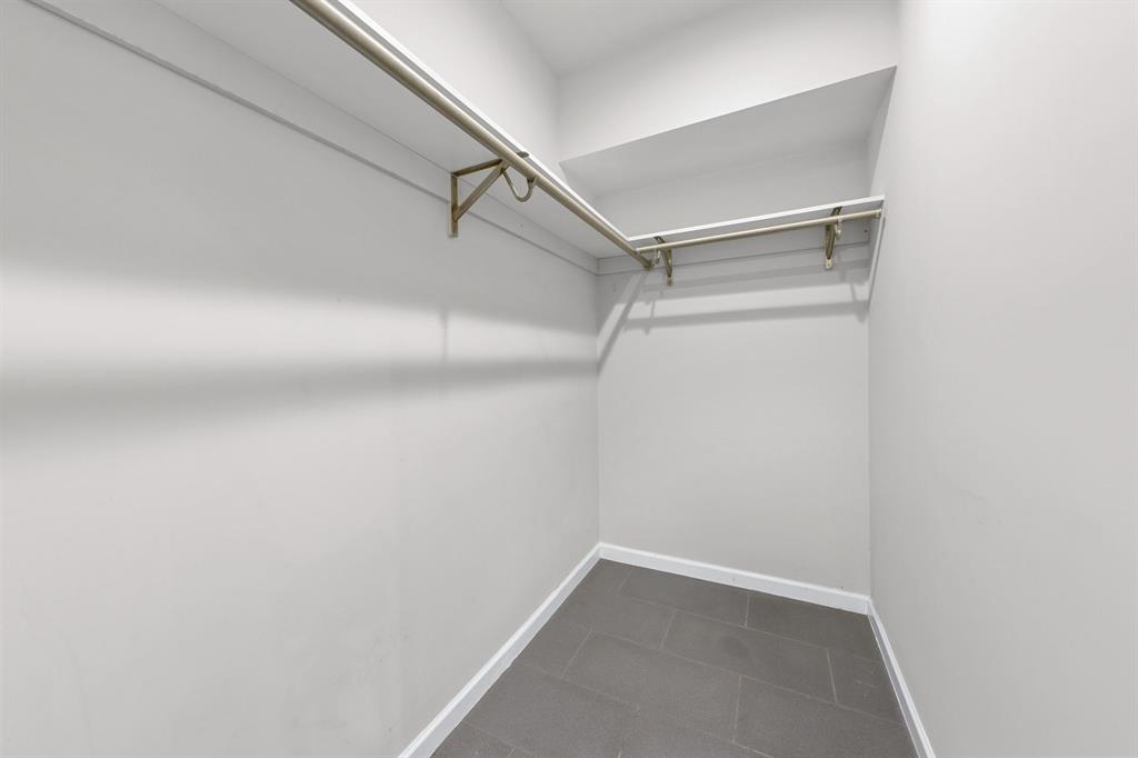 3110 Red River Street, Unit 116 Austin, TX 78705 - Photo 5 of 8 a view of an empty walk in closet