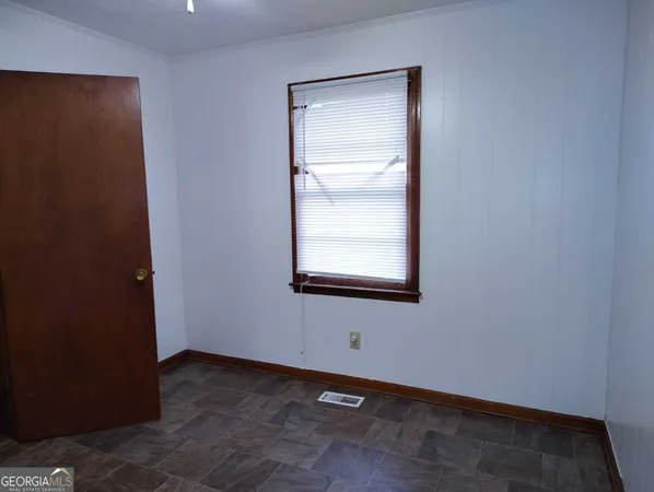 an empty room with a window