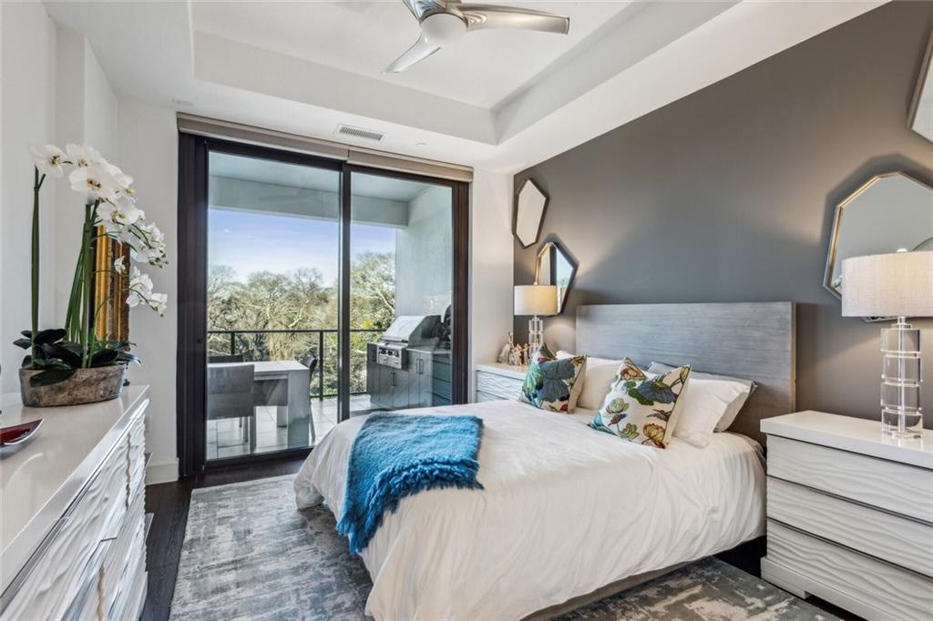 2520 Peachtree Road, Unit 602 Atlanta, GA 30305 - Photo 19 of 45 a bedroom with a large bed and a large window