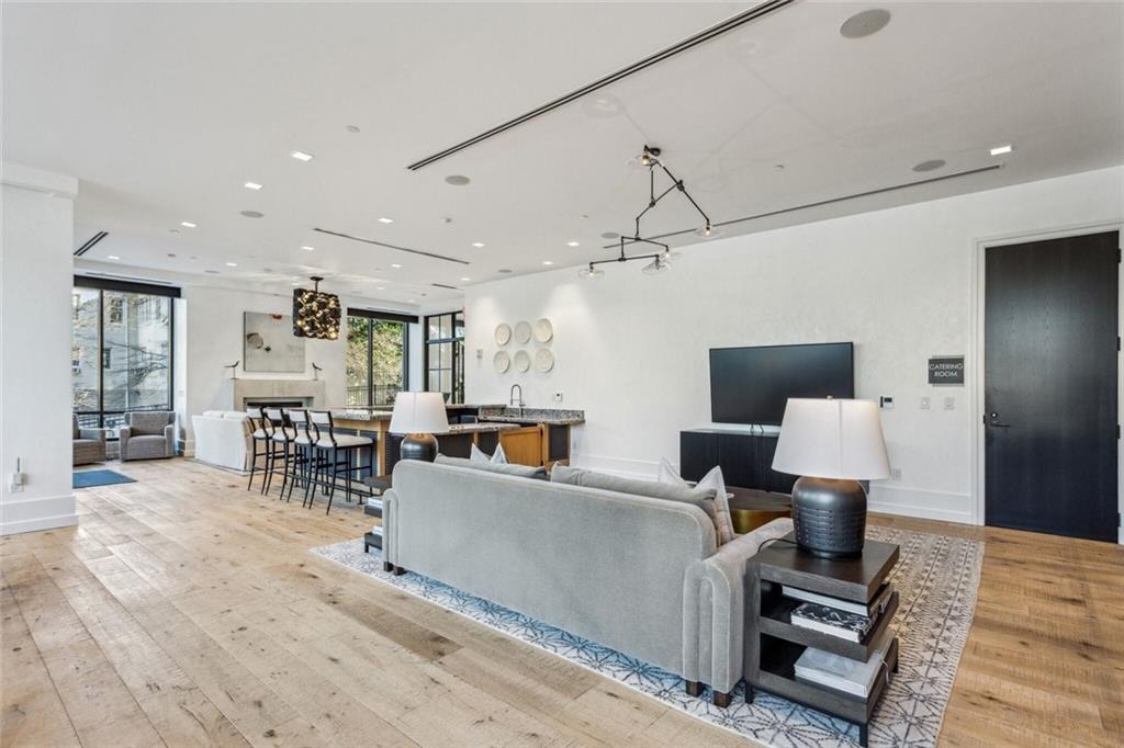 2520 Peachtree Road, Unit 602 Atlanta, GA 30305 - Photo 33 of 45 a living room with furniture and a table