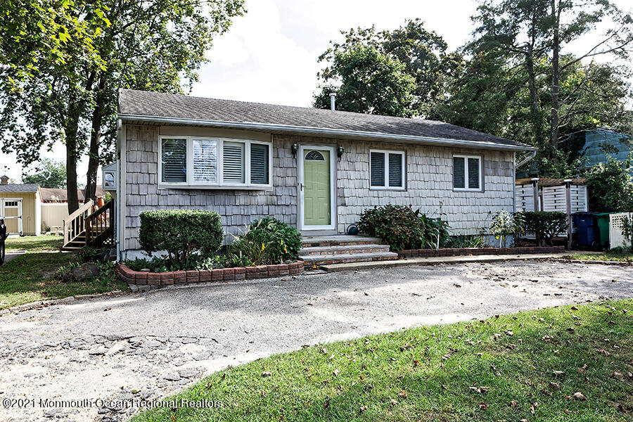 458 Dover Road Toms River, NJ 08757 - Photo 2 of 13 a front view of a house with a yard