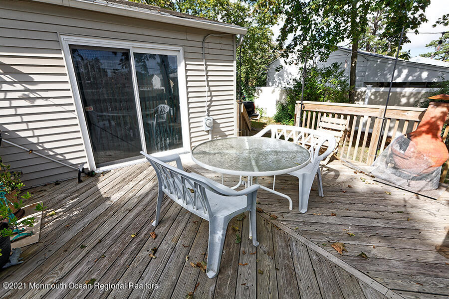 458 Dover Road Toms River, NJ 08757 - Photo 12 of 13 a view of a deck with furniture