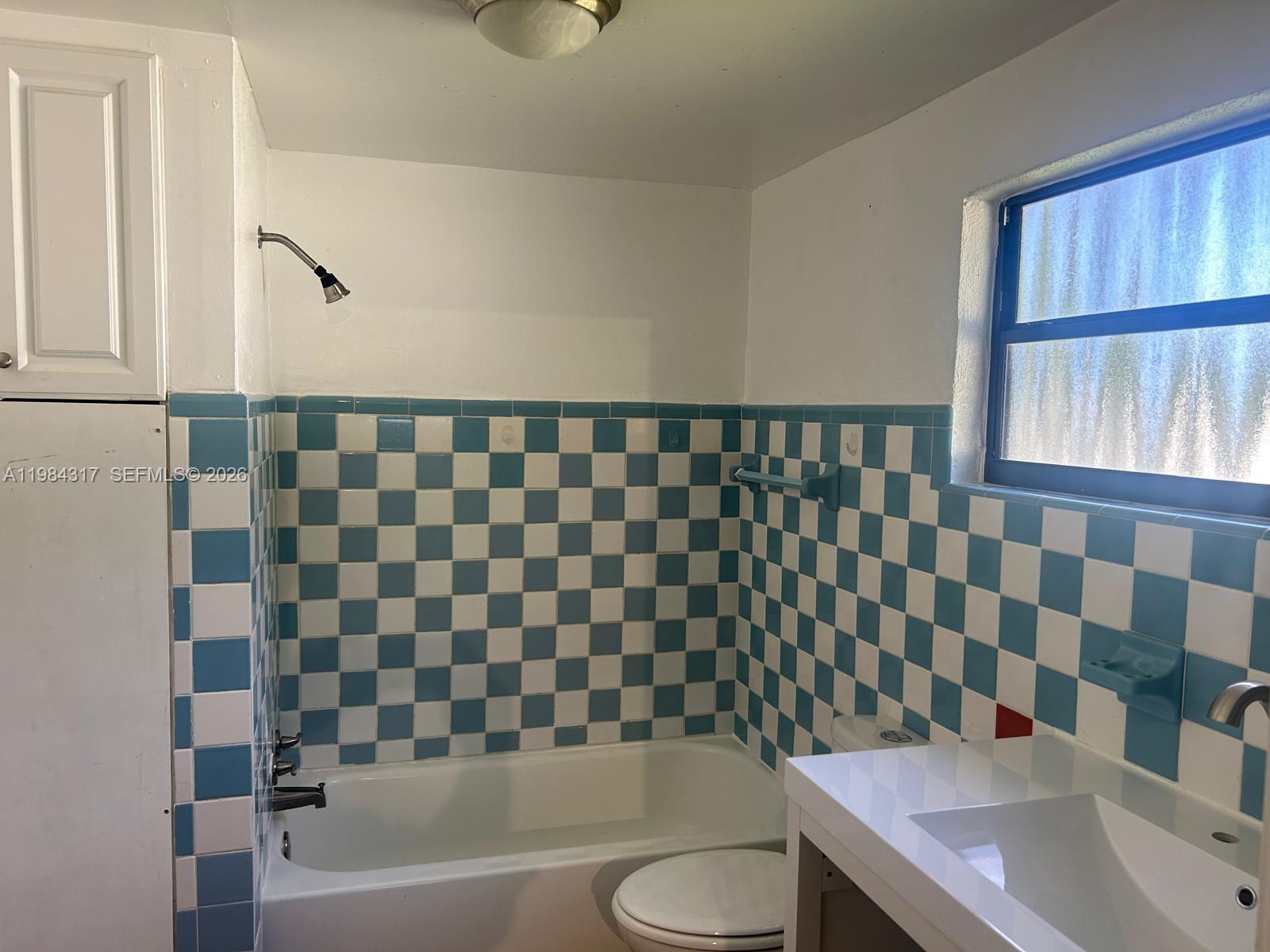 8866 Southwest 126th Street Miami, FL 33176 - Photo 6 of 20 a bathroom with a bathtub and a shower