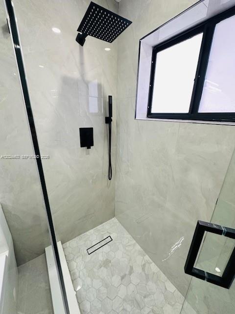 11870 Southwest 5th Street, Unit 1 Miami, FL 33184 - Photo 35 of 38 a bathroom with a shower and a sink