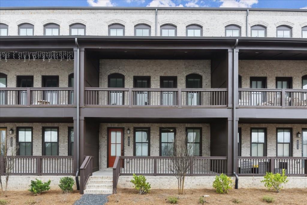 6820 Victory Run Alpharetta, GA 30005 - Photo 1 of 1 a front view of residential houses