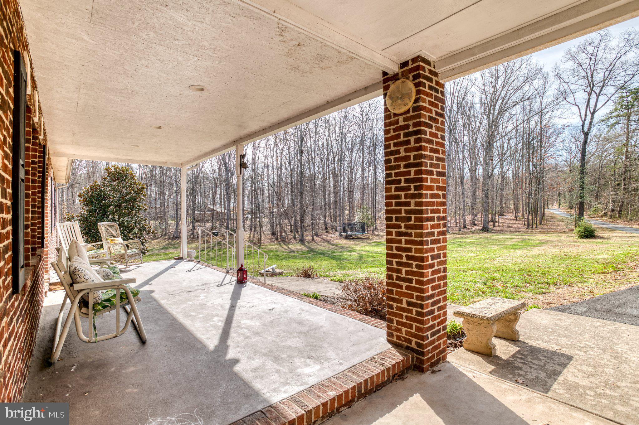 3220 Courtney School Road Midland, VA 22728 - Photo 10 of 111 Serene porch with nature's embrace.