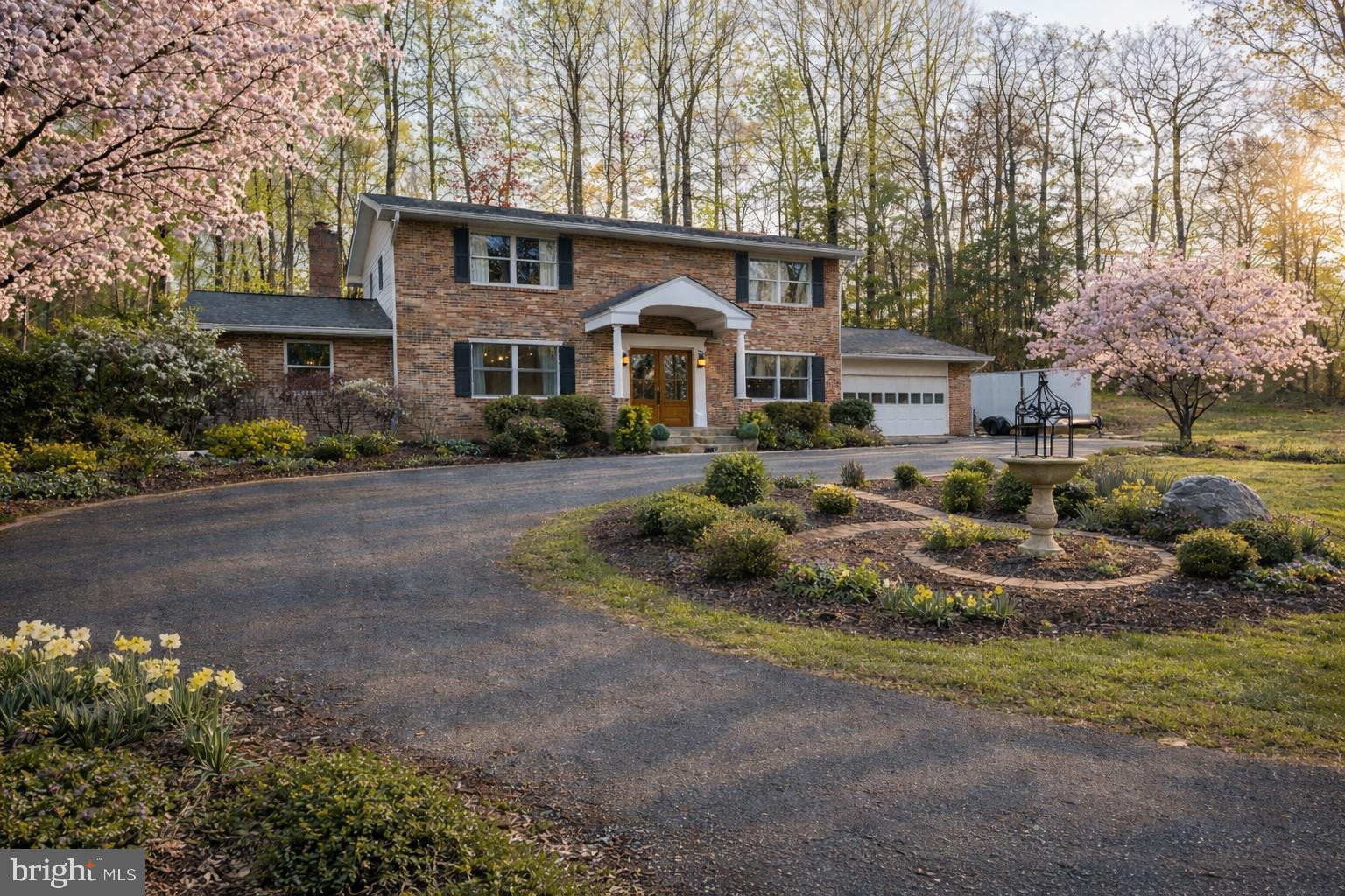 2701 Omisol Road Woodbridge, VA 22192 - Photo 2 of 3 a front view of a house with a yard