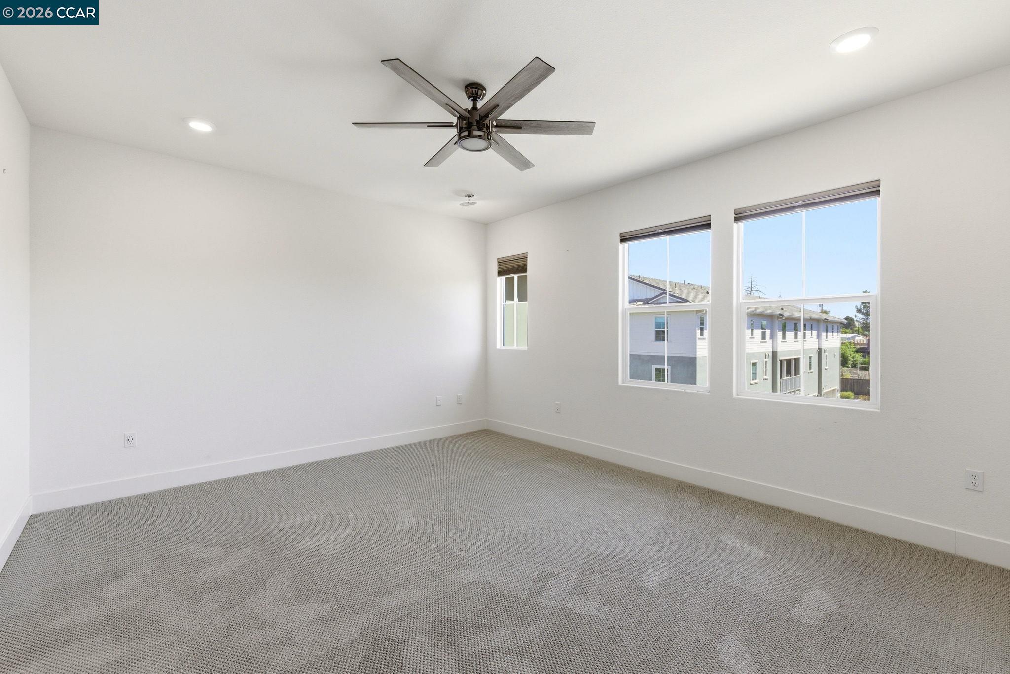 205 Plum Tree Street Livermore, CA 94551 - Photo 34 of 47 an empty room with windows and fan