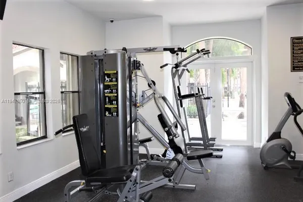 a view of a room with gym equipment
