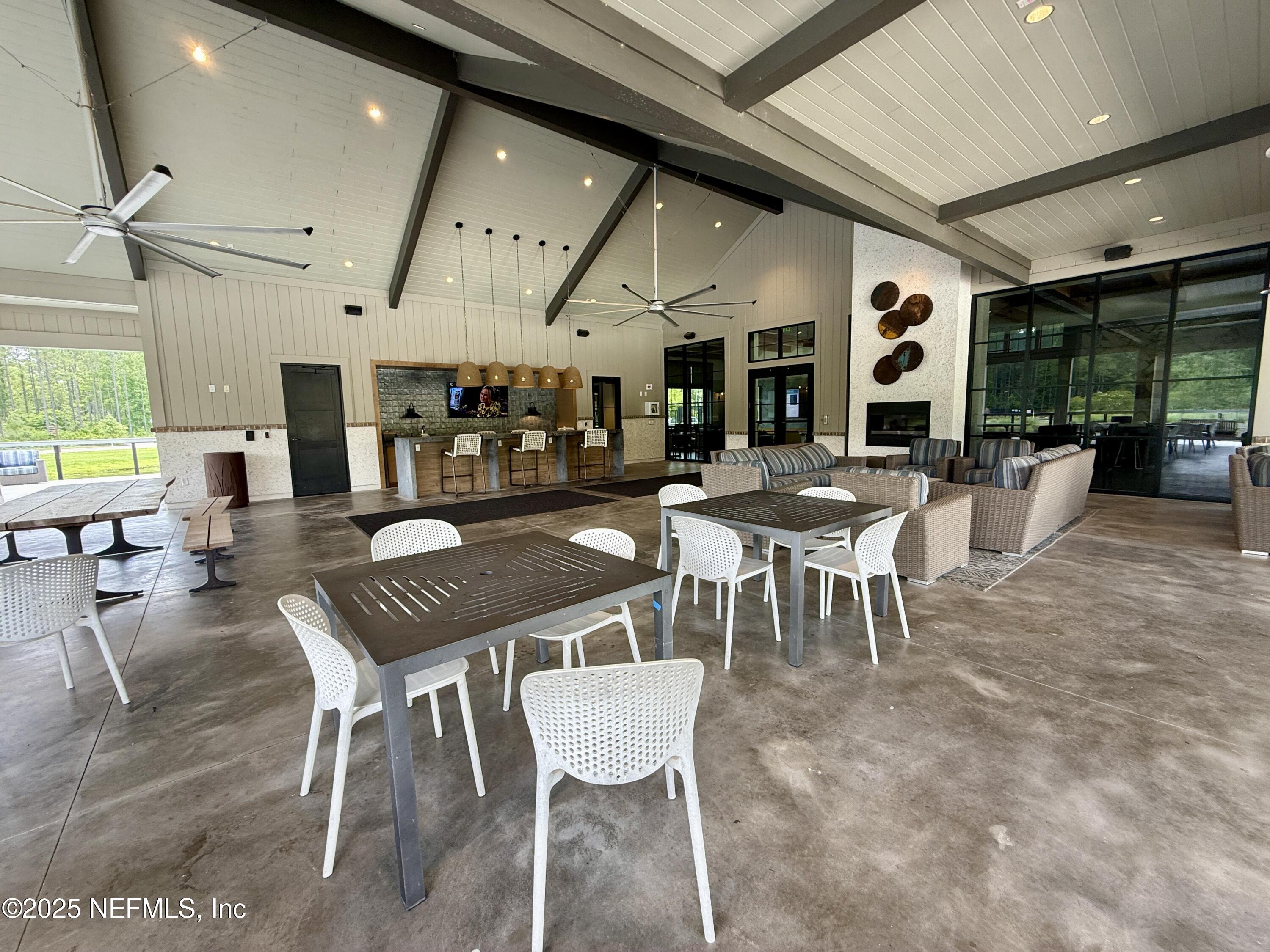 75310 White Rabbit Avenue Yulee, FL 32097 - Photo 55 of 61 a view of a dining room with furniture